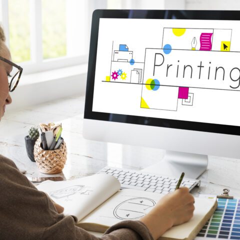 Desktop representation showcasing diverse desktop publishing software interfaces.